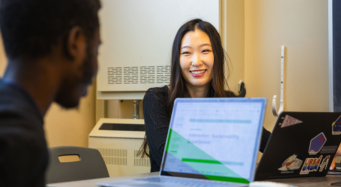 Photo of liz taking with classmate.