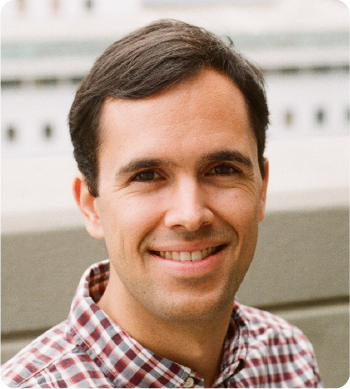 A color photo of a man.