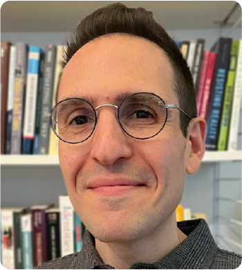 A color photo of a man.