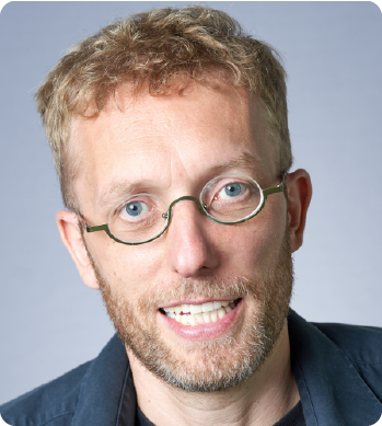 A color photo of a man.