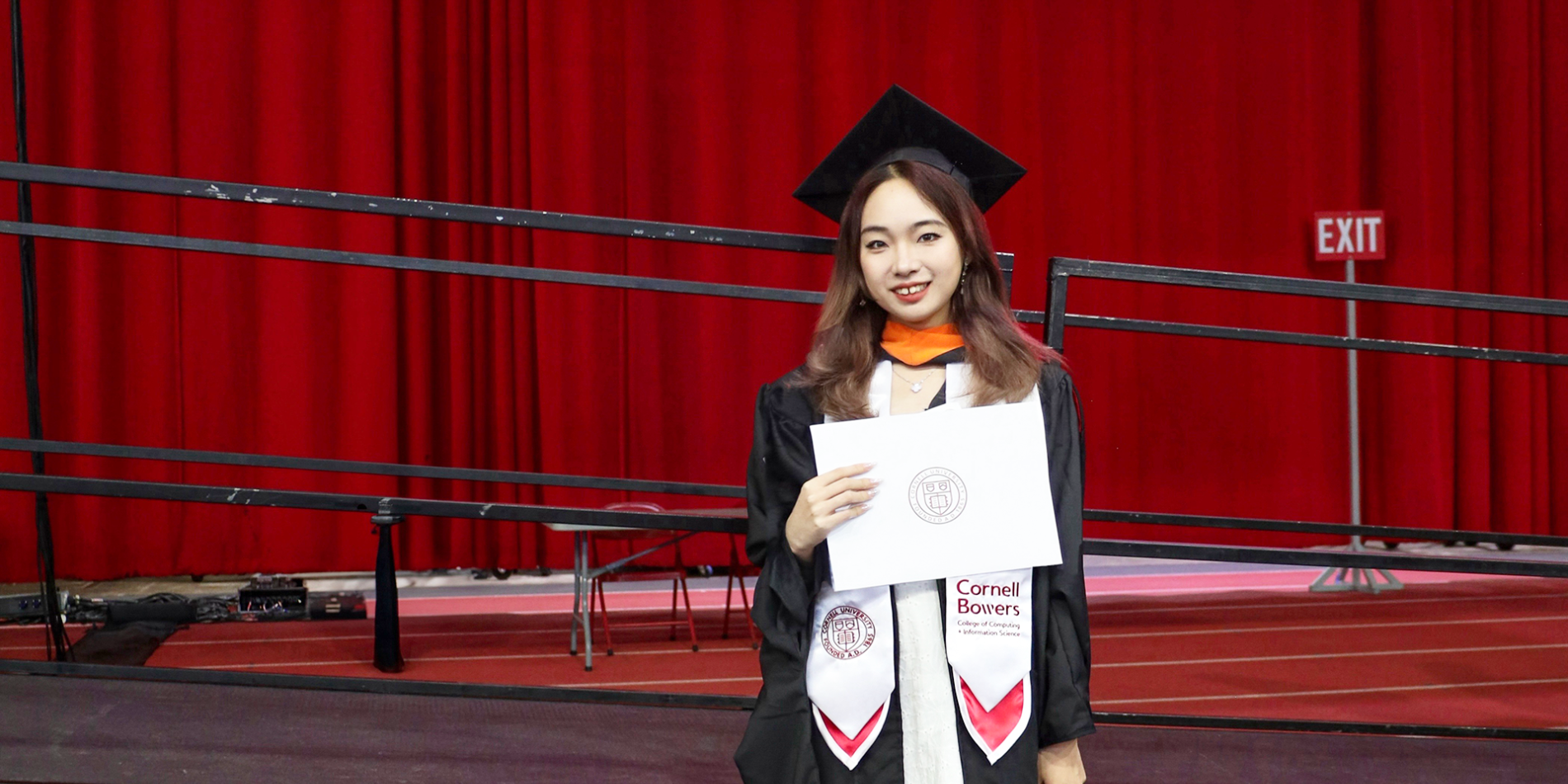 A color photo of a woman after graduation.