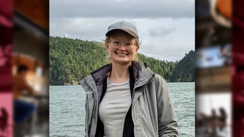 Portrait of Sarah Dean an AI2050 Fellow standing outside