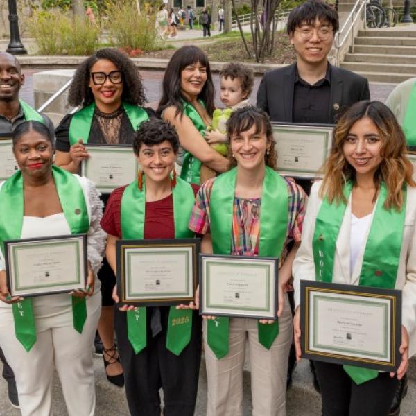 Cornell's nine 2025 Bouchet Scholars with one of the scholar's sons