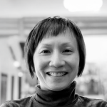 A black and white photo of K.-Y. Daisy Fan, a woman with short dark hair in a turtleneck.