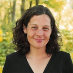 A color photo of Marcie Lanham outside