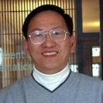 Portrait of man wearing glasses, dark hair