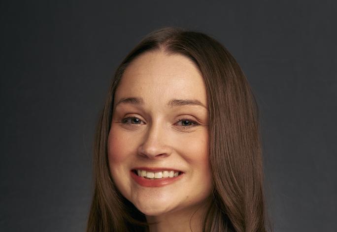 rebecca fox in a gray sweater