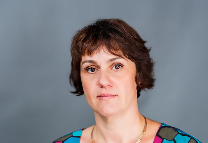 A color portrait of a woman.