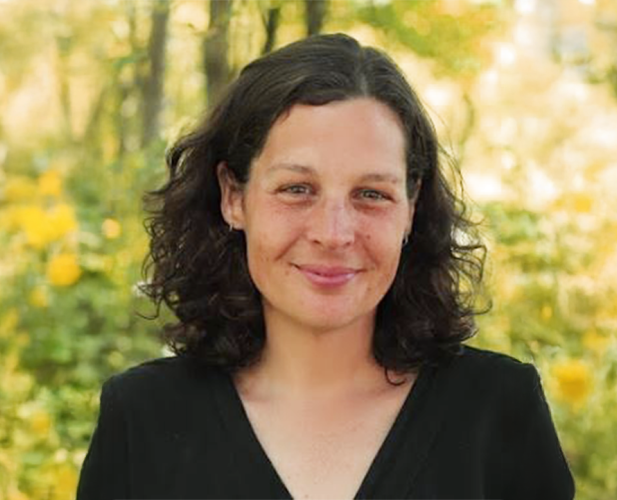 A color photo of Marcie Lanham outside