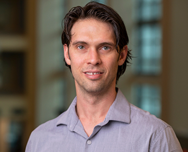 Portrait of man in dress shirt, black hair
