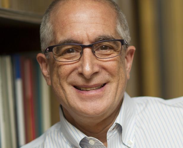 Portrait of man with glasses and graying hair 