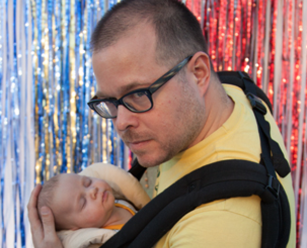 Photo of Chris Csíkszentmihályi holding his baby