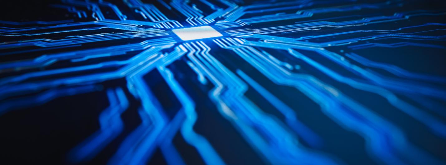  a blue computer board drive with leading pathways into the middle chip