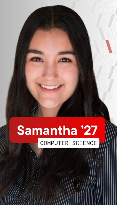 a young female student with long brown hair smiling 