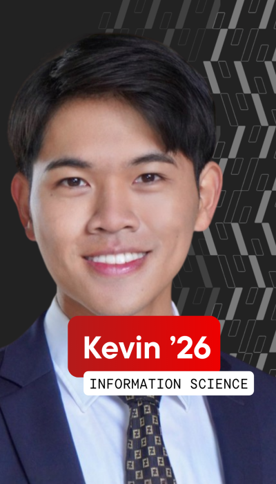 a young Asian man with dark hair and a blue jacket and tie